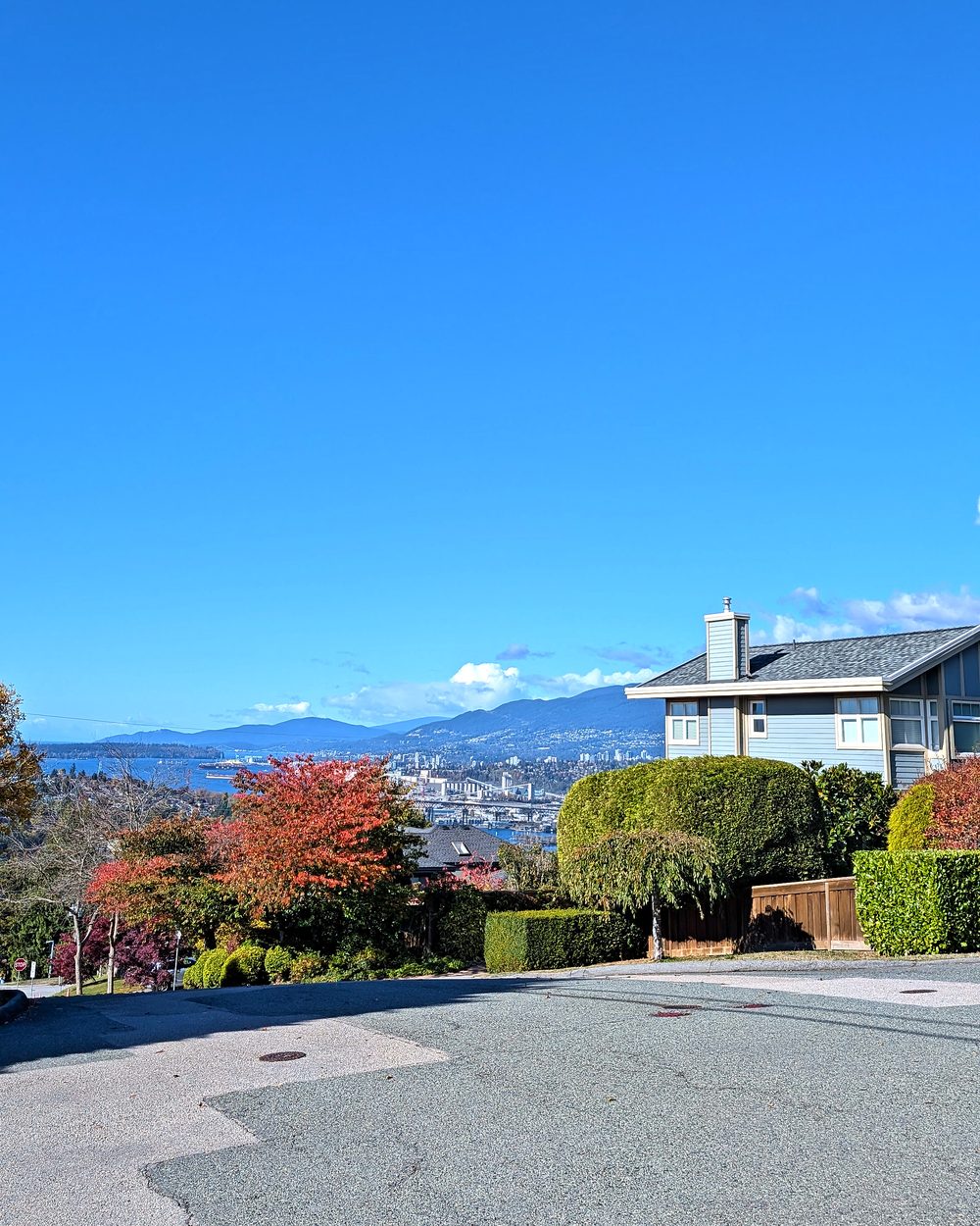 A Capitol Hill street, with the North Shore mountains beyond