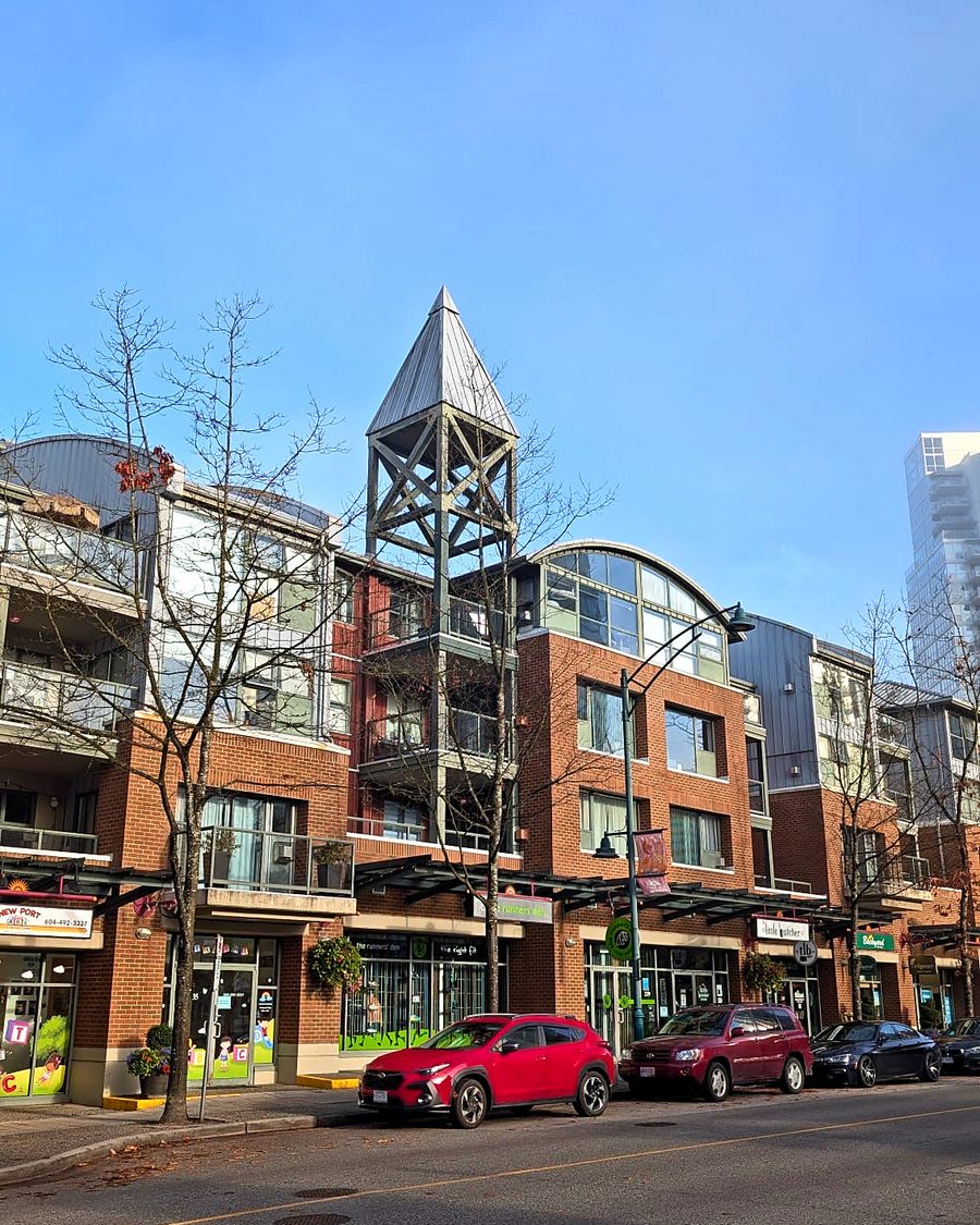 Shops and the corner tower at Newport Village, Port Moody