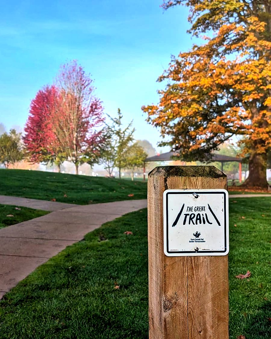 The Shoreline Trail at Rocky Point Park, with a Trans Canada Trail marker